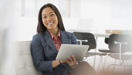 Businesswoman sharing information from a tablet